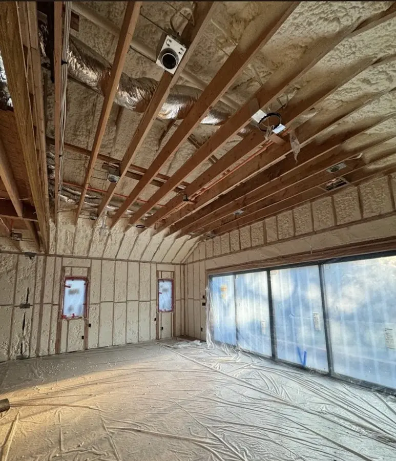 Interior walls and ceiling insulated with spray foam during new construction in Napa